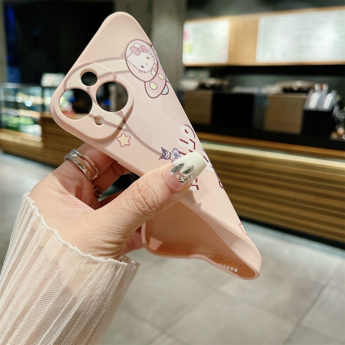 Kuromi and Hello Kitty Astronaut phone case