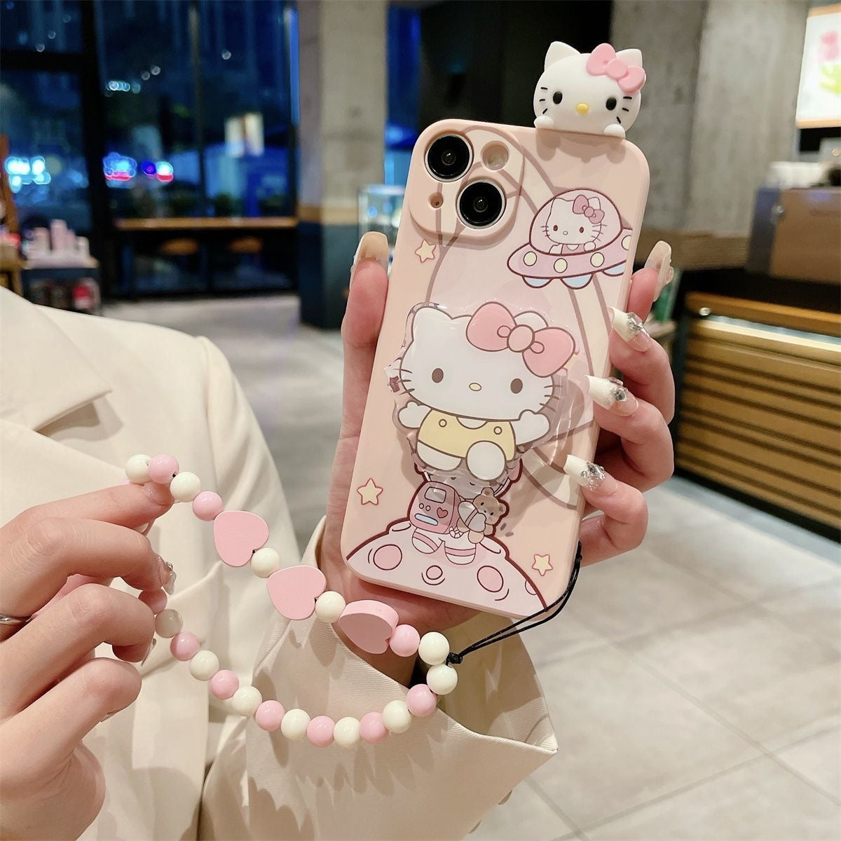 Kuromi and Hello Kitty Astronaut phone case