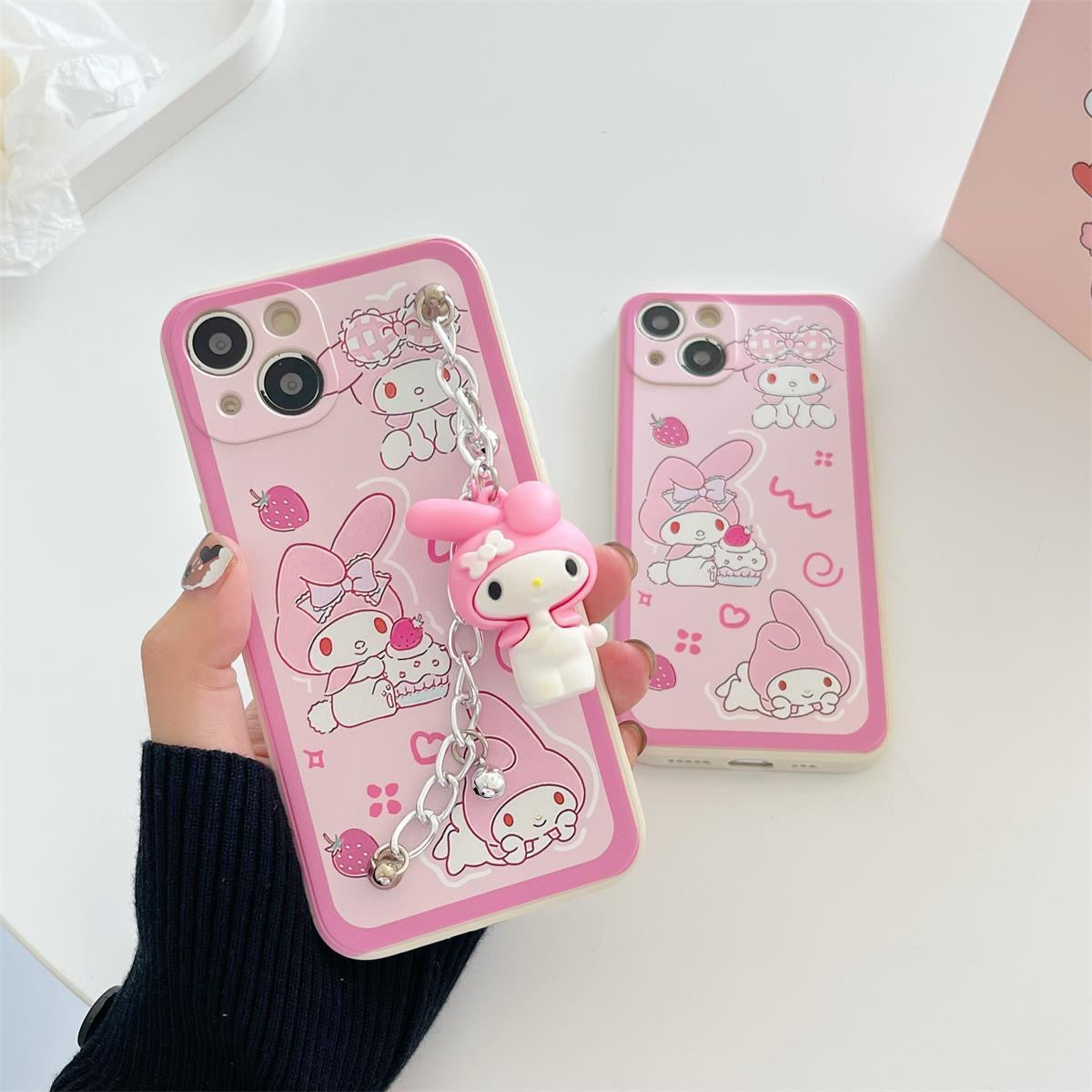 Funda para teléfono Sanrio con dije