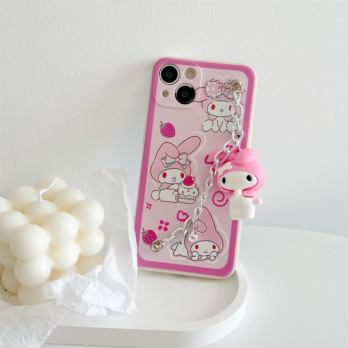 Funda para teléfono Sanrio con dije