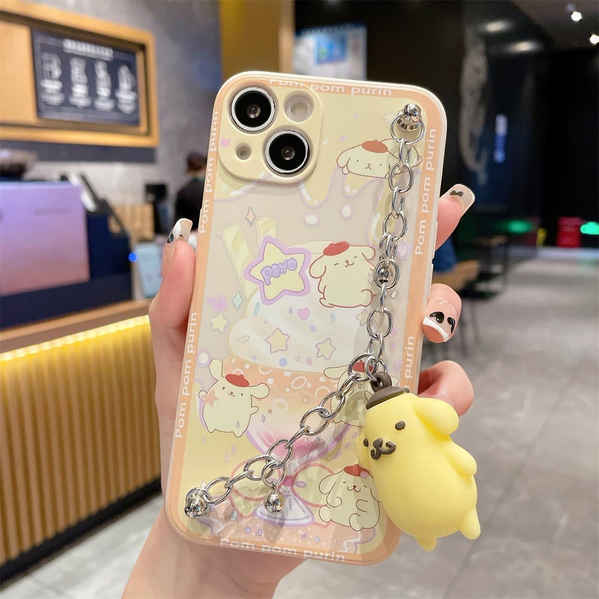 Funda para teléfono Sanrio con dije