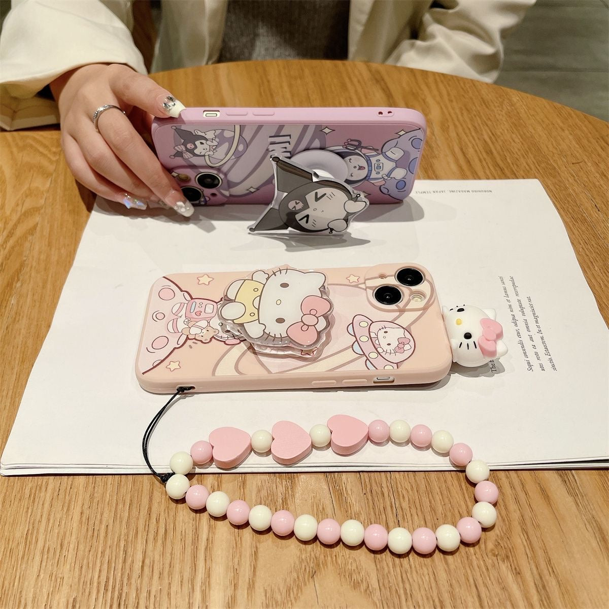 Kuromi and Hello Kitty Astronaut phone case – Joykawaii Kuromi and Hello Kitty Astronaut phone case – Joykawaii