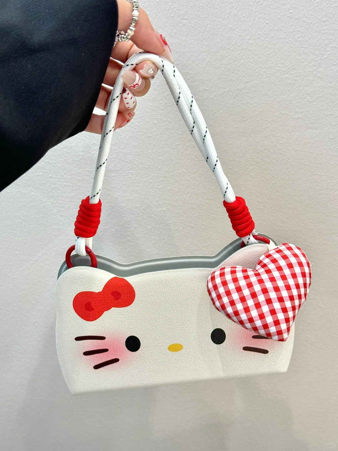 Hello Kitty Flip phone case with heart pendant