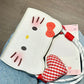 Hello Kitty Flip phone case with heart pendant