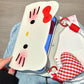 Hello Kitty Flip phone case with heart pendant